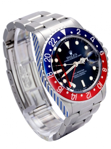 Side view image of a beautifully aged vintage Rolex GMT-Master 16750 Pepsi
