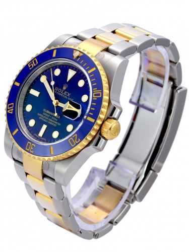 Side view of bimetal Rolex Submariner Date 116613LB with a blue ceramic bezel insert and blue dial