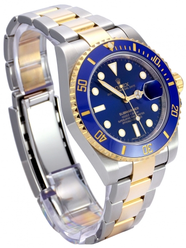 Side view of a 2019 bimetal Rolex Submariner Date 116613LB in stainless steel & yellow gold with a blue bezel insert and blue dial