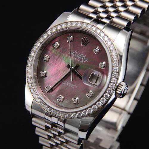 Detailed view image of a used Rolex Datejust 116244 with a black mother of pearl diamond dot dial and presented on a Jubilee bracelet