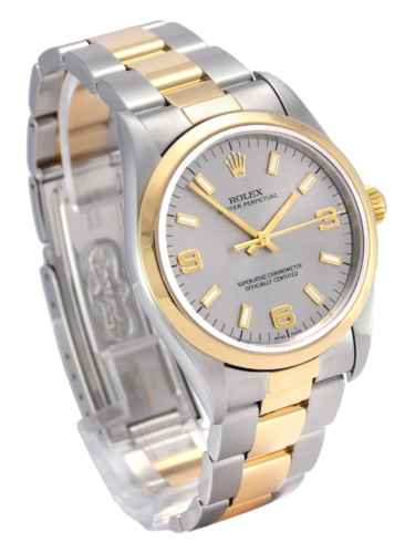 Side view image of a bimetal Rolex Oyster Perpetual 14203M in stainless steel & yellow gold, with a beautiful grey dial