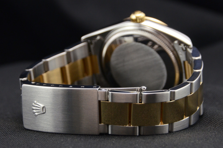 Detailed view image of a bimetal Rolex Oyster Perpetual 14203M in stainless steel & yellow gold, with a beautiful grey dial