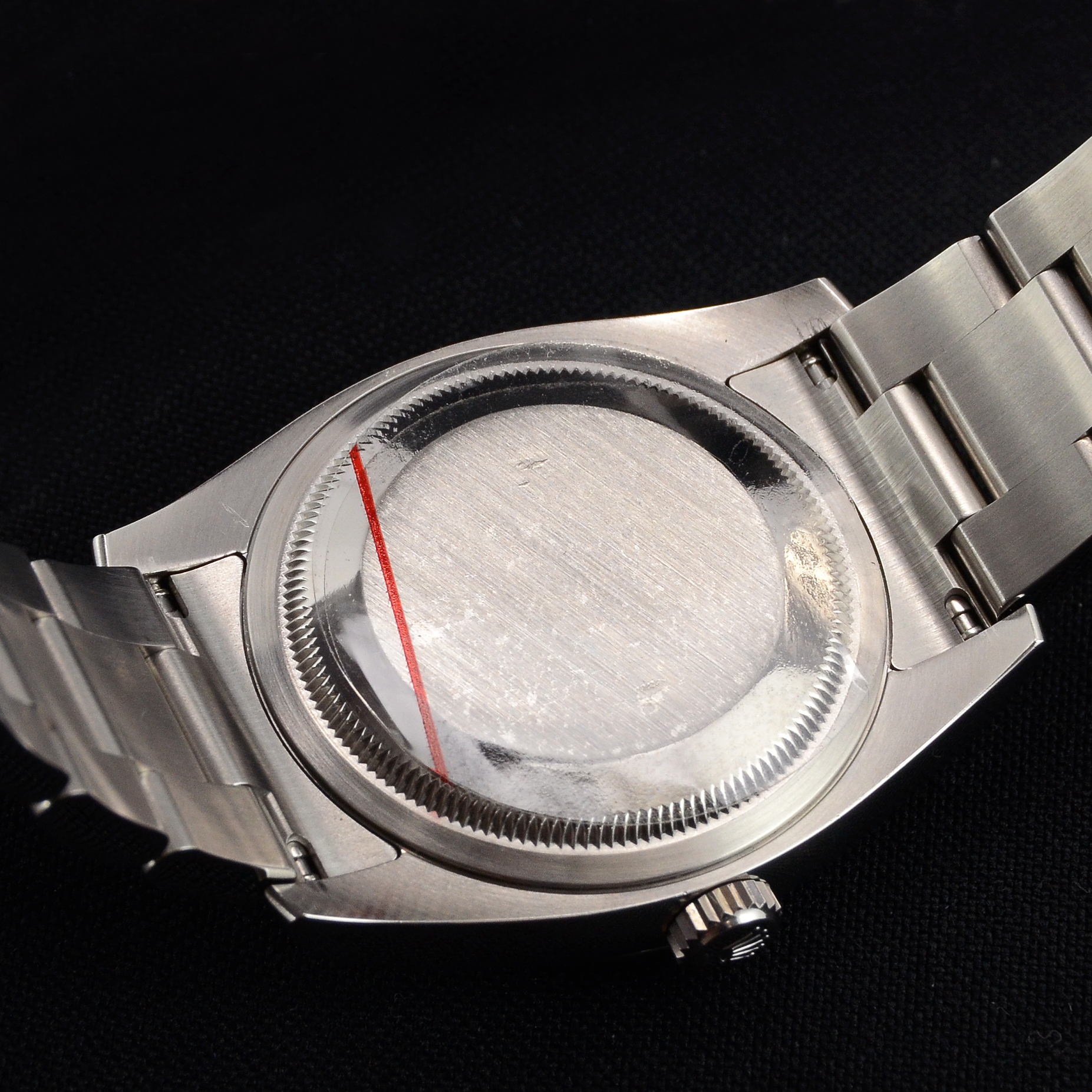 Second Hand Rolex Oyster Perpetual 116000 with a red grape (purple) dial Front view image of a used Rolex Oyster Perpetual 116000, 36mm case size, on a stainless steel Oyster bracelet with a starburst effect red grape dial