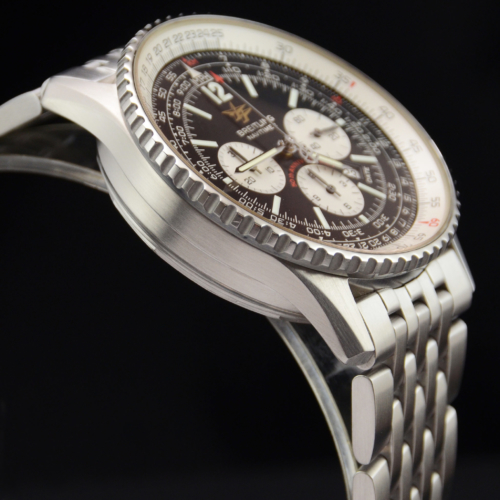 Detailed view of a previously owned Breitling Navitimer A41322 50th Anniversary Special Edition in stainless steel with a black dial