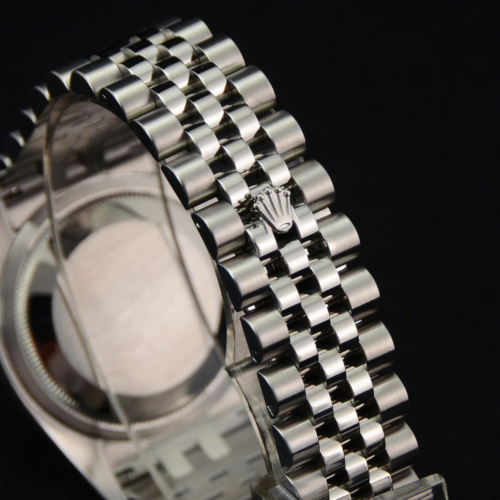 Rolex Datejust 116234 with a white roman numeral dial, presented on a jubilee bracelet