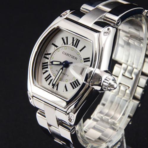 A detailed view image of a previously owned Cartier Roadster 2510 with a silver dial