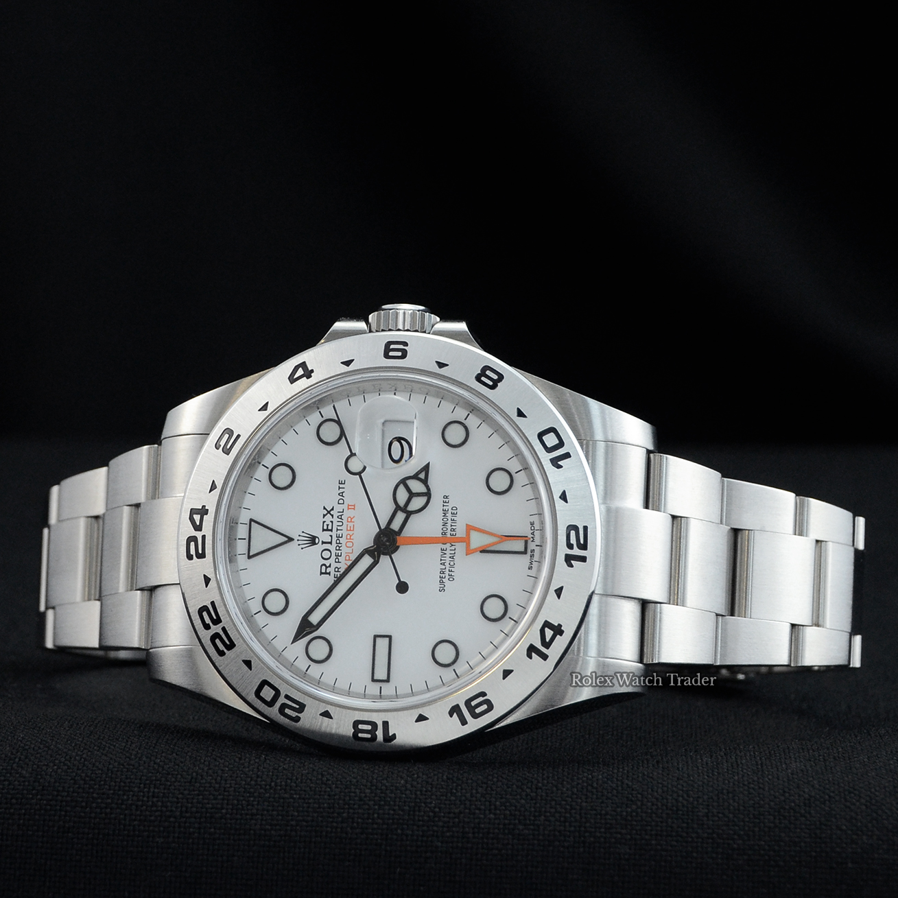 Overview of the watch resting on its case side Rolex Explorer II 216570 42mm White Dial Discontinued 2019 For Sale Available Purchase Buy Online with Part Exchange or Direct Sale Manchester North West England UK Great Britain Buy Today Free Next Day Delivery Warranty Luxury Watch Watches