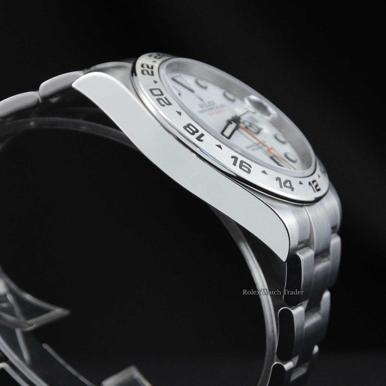 Overview of the watch resting on its case side Rolex Explorer II 216570 42mm White Dial Discontinued 2019 For Sale Available Purchase Buy Online with Part Exchange or Direct Sale Manchester North West England UK Great Britain Buy Today Free Next Day Delivery Warranty Luxury Watch Watches