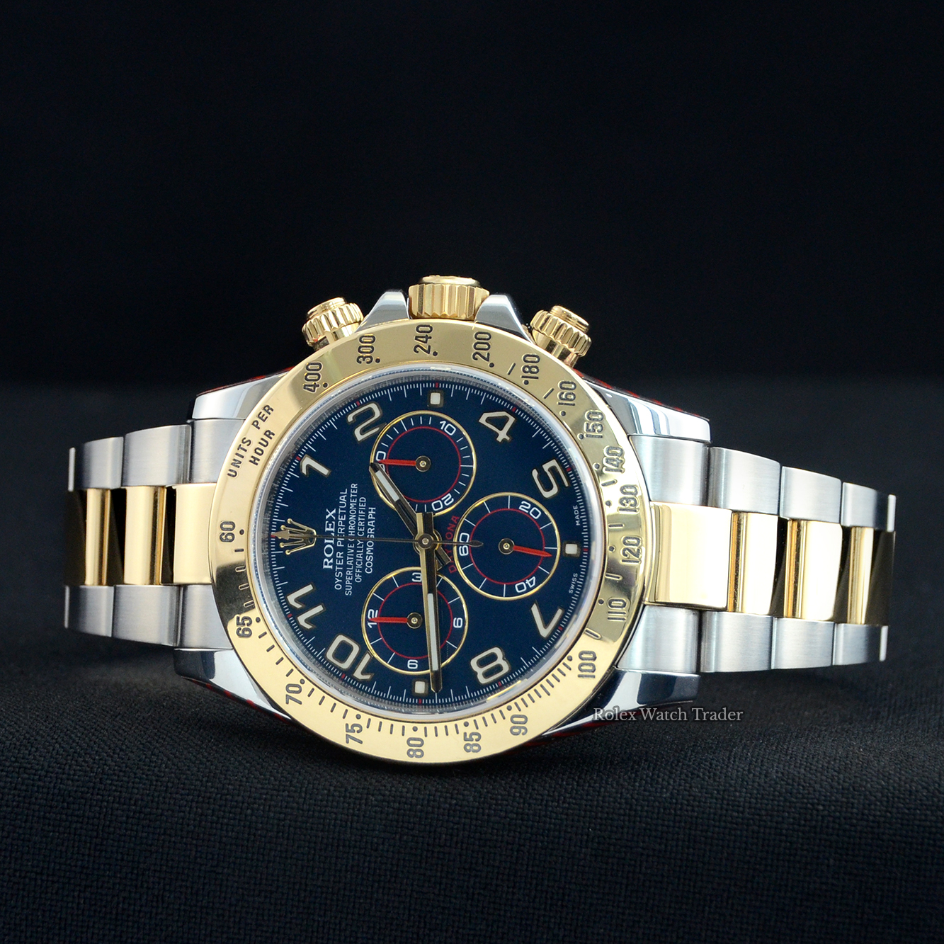 Overview of the watch resting on its case side Rolex Daytona 116523 Bi-Metal Rolex Service Unworn with Service Stickers For Sale Available Purchase Buy Online with Part Exchange or Direct Sale Manchester North West England UK Great Britain Buy Today Free Next Day Delivery Warranty Luxury Watch Watches