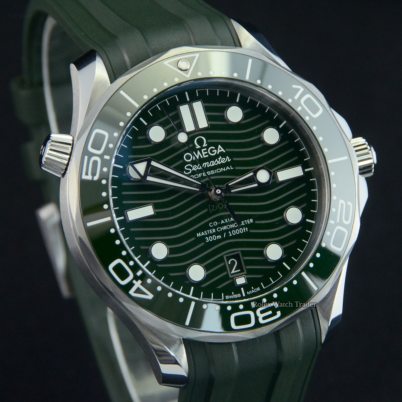 Dial detail, facing right Omega Diver 300M Co‑Axial Master Chronometer 42mm 2022 Unworn Green Dial For Sale Available Purchase Buy Online with Part Exchange or Direct Sale Manchester North West England UK Great Britain Buy Today Free Next Day Delivery Warranty Luxury Watch Watches
