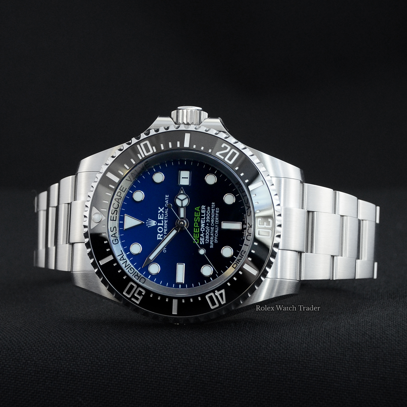 Overview of the watch resting on its case side Rolex Sea-dweller Deepsea 136660 Unworn 2022 For Sale Available Purchase Buy Online with Part Exchange or Direct Sale Manchester North West England UK Great Britain Buy Today Free Next Day Delivery Warranty Luxury Watch Watches