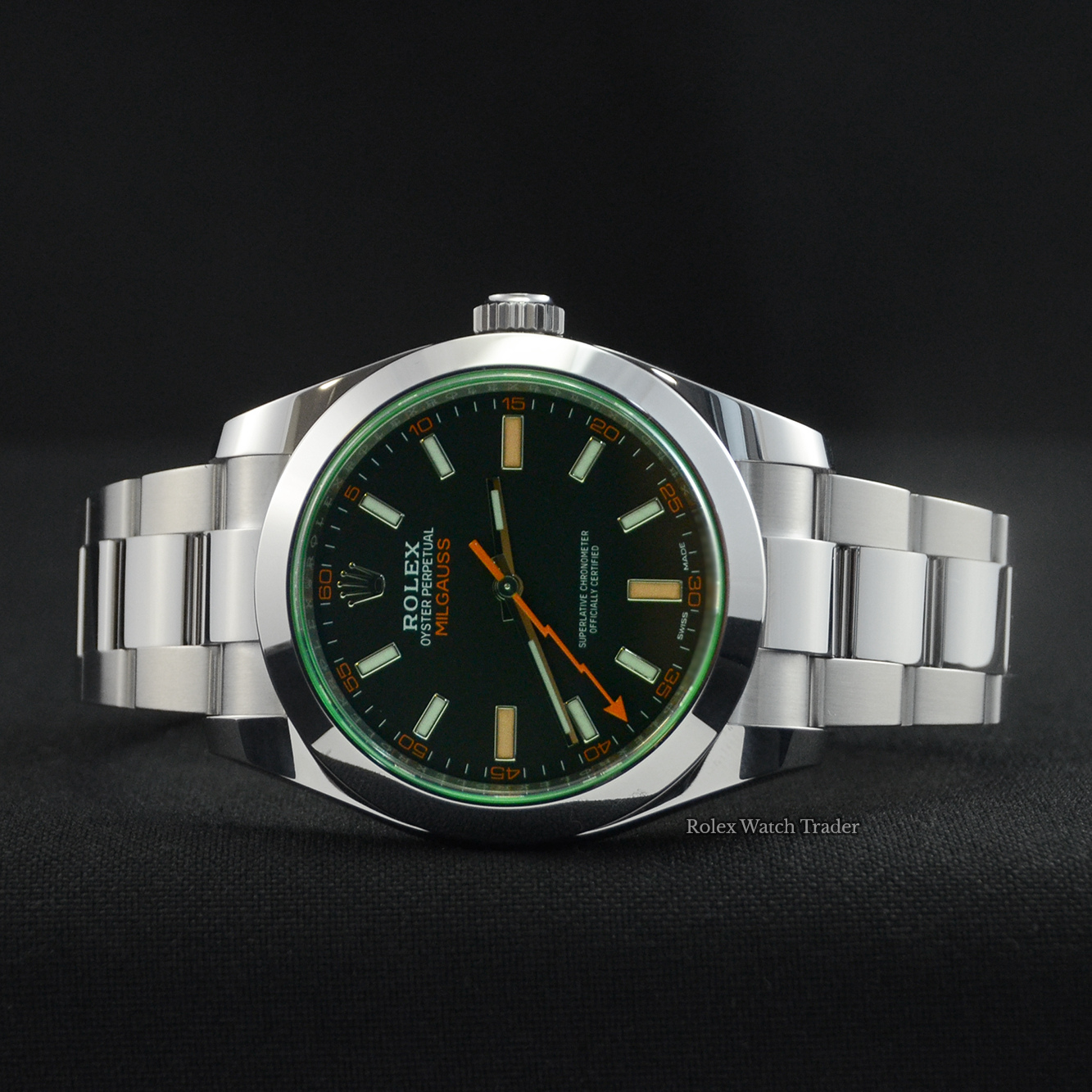 Overview of the watch resting on its case side Rolex Milgauss 116400GV Black Dial 2022 Unworn For Sale Available Purchase Buy Online with Part Exchange or Direct Sale Manchester North West England UK Great Britain Buy Today Free Next Day Delivery Warranty Luxury Watch Watches